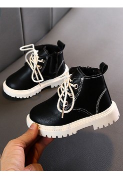 Чорні демісезонні дитячі черевики на білій підошві